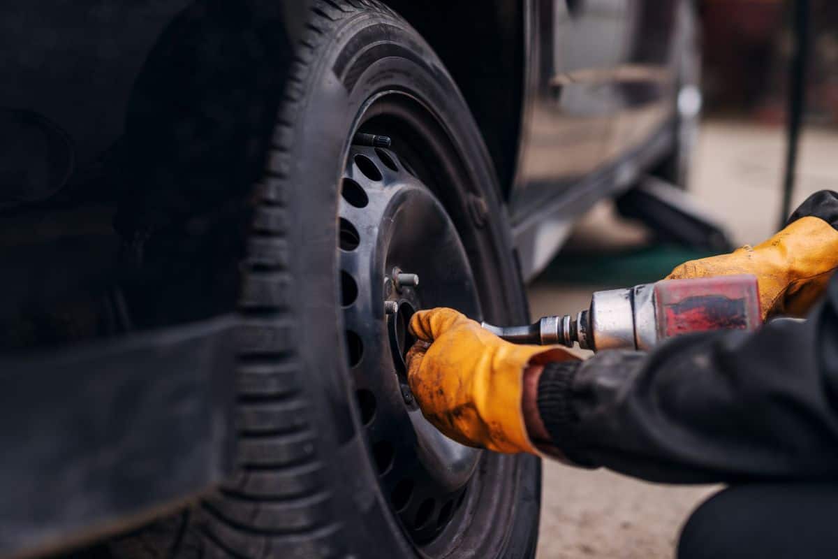 Changing a tire with an impact driver