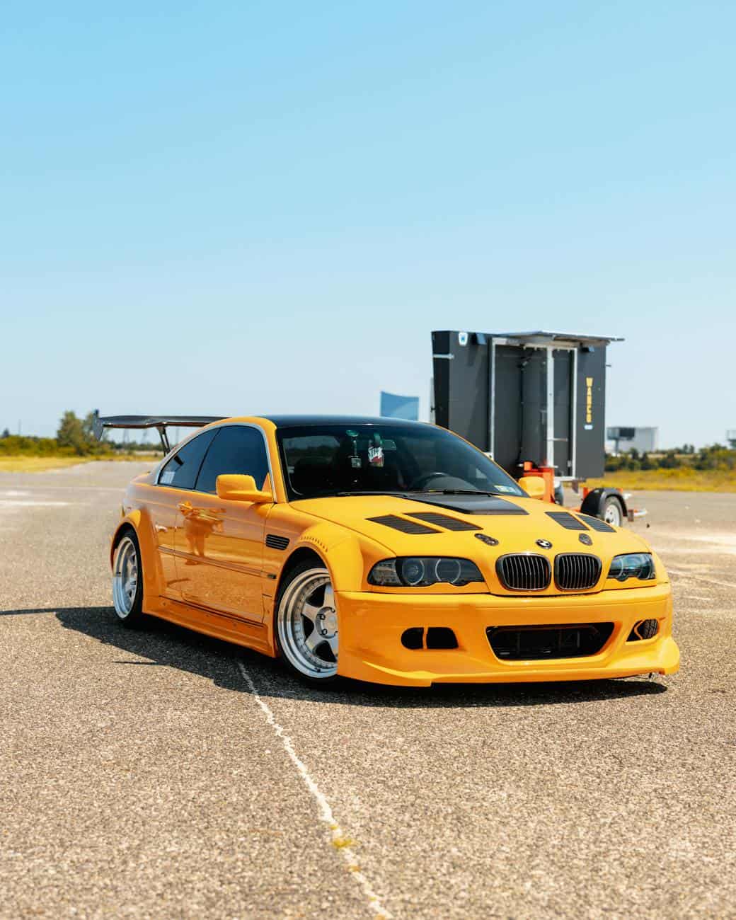 yellow bmw car